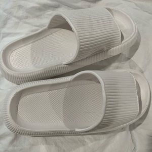 Cloudies brand new. Women size 11. White